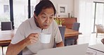 Household budget, finance planning and online banking with a senior asian man working on a laptop and drinking coffee. Mature male checking his investment and savings while banking in the kitchen