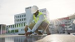 Solar power engineer fixing, repairing or checking panels on building roof for harvesting biodegradable energy source from sun. Engineer, architect or technician monitoring and performing maintenance