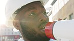 Building manager with megaphone talking, explaining and instructing construction workers, architects and engineers. Closeup headshot or infrastructure leader face motivating staff on development site