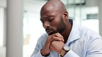 Thinking, serious and bald African American businessman or entrepreneur planning business strategy budget. Modern man with finance issues or financial problems doing taxes, loan and debt payments.