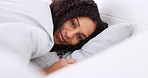 Woman, portrait and bedroom with shy hand gesture to hide face from person in the room. Cute and tired girl resting on pillow for nap to relax at home with embarrassed and playful smile.