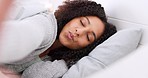 Black woman, sleep and girl kiss, relax in bed with portrait of happy girl in bedroom of her home. Smile, rest and comfort with a young female lying in blankets and smiling in the morning in a house
