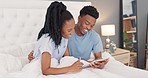 Black couple, bed and tablet laughing for social media, entertainment or browsing funny memes online at home. Happy African American man and woman enjoying fun time together on touchscreen in bedroom