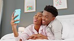 Couple phone selfie, love and bedroom date in house, luxury home or honeymoon hotel for playful bonding. Happy, smile and comic man and fun black woman with communication technology for social media