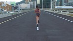 Woman running, fitness and health in cardio exercise for fast, muscle and fit body lifestyle routine in the city. Female runner in training run, exercising and workout for a healthy life in the town.