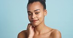 Skincare, natural beauty and black woman portrait for cosmetics, wellness and youth on blue studio background mock up or copy space. Young African model facial or face for anti aging with mockup