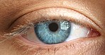 Macro blue eye, iris and vision of a pupil in optometrist exam for eyesight or contact lens for medical healthcare. Closeup portrait of a human eyeball opening in sight, zoom and optic detail to scan