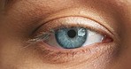 Vision, eyes and healthcare with the eye of a young woman in a test or exam for prescription eyewear or contact lenses. Female testing her eyesight during an appointment at an optometrist or optician