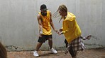 Man dance with black woman, recording hip hop video or social media post. Young African dancers with lady shooting on phone camera, show body movement to music for people watching on internet or tv