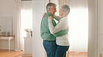Happy senior couple, retirement and dancing together in love, care and bonding time in happiness at home. Elderly retired man and woman sharing a dance in sweet joyful romance for relationship