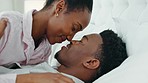 Black couple, nose or love bond in bedroom, hotel or house interior for romantic honeymoon, valentines day date or anniversary. Smile, happy or trust man and woman in security and safety relationship