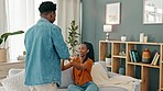 Love and happy relax couple with coffee spending quality time, peace and bonding together on weekend break. Romance, black woman and tea delivery from caring man or boyfriend on home living room sofa