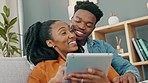 Love, sofa and black couple shopping on tablet while they relax together in the living room. African people compromise, decide and plan home apartment ecommerce order delivery logistics.