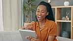 Video call, digital and tablet with black woman greeting virtual meeting while sitting on her sofa in her living room at home. Hello, communication and smile with young female and online conversation