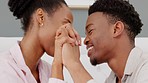 Touch, love and intimate black couple bonding in bed together, flirt and happy. Playful husband and wife show affection, relax and enjoy fun in bedroom. Man and woman embrace, healthy relationship