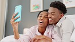 Couple selfie on smartphone camera, happy black woman kiss african man playful love and relax in home bedroom. Mobile technology internet, fun morning smiles online and new family marriage connection