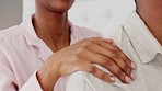 Shoulder, hand and massage in body care and love of a black woman touching husband at home for relaxation. Closeup hands of a female massaging shoulders of her man in the bedroom for stress relief