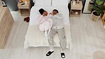 Happy couple excited to go to bed at night, jump on bedroom furniture for sleeping and time to relax in room. Energy, happiness and smile African man and woman going to sleep in apartment room