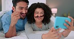Comic couple phone selfie, interracial love and streaming funny video for mobile app chat, funny communication with internet and happy together in bedroom. Comedy man and woman with meme face