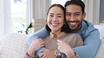 Couple happy love laughing, living room home and enjoy new home interior. Property homeowner lifestyle, beautiful asian woman and funny young man. Relax on sofa, couch cuddle and content relationship
