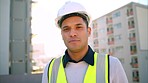 Building engineer, construction worker and engineering man with smile, motivation and property vision for real estate architecture. Portrait of happy development employee with helmet on working site