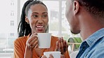 Couple coffee drink, funny conversation and relax in the morning in house, talking with tea and comic discussion in marriage in living room in home. African man and woman in comedy communication