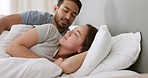 Couple, morning and bedroom love between man and woman lying in bed and waking up from sleep, rest or nap. Happy asian husband and wife laugh and greet while spending free time together to relax