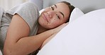 Relax, sleep and portrait of woman in bed, waking up to a new morning and feeling fresh and happy. Smile, comfort and rest with young asian enjoying a peaceful day indoors, relaxing in home in China 