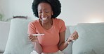 Excited, celebration and woman with pregnancy test with wow, yes and happy expression on her home sofa. Happiness, surprise and smile of a young mother with pregnant results after ivf 