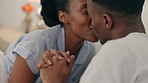 Love, kissing and smile bedroom black couple relaxing, romance and bonding together at home. Happy care, valentines day and intimate young african people in loving relationship on special honeymoon