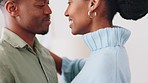 Love and happy couple dancing with a kiss together at home for celebration, marriage success or valentines day anniversary. Happiness, care and romantic black people, man and woman dance on a date