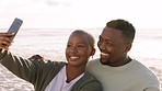 Happy, selfie and couple love at beach with 5g network phone photography of sunset for social media, internet or website app. Smile, black woman and man with tech while travel, ocean and picnic. 
