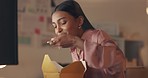 Dance, fast food and eating with a business woman enjoying a takeaway meal while working late in her office at night. Supper, dancing and cheerful with a young female employee at work by her desk 