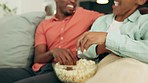 Love, happy and couple with popcorn play with food on relax day at home laugh, romantic and enjoy quality time together. Happiness, smile and black woman and man playing fun game on living room sofa