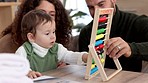 Education, parents and child learning math or numbers and improve toddlers creative skills with his family. Teamwork, mother and father teaching a smart kindergarten kid and helping the boy together