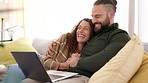 Couple with laptop on sofa watch movie, series or comedy together in home. Young woman smile in man arms while relax on living room couch, streaming funny video or film on internet in their house