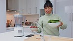 Nutrition diet and woman with smoothie fruit blender for a healthy breakfast drink in kitchen. Lifestyle nutritionist girl preparation for vitamin shake beverage with fresh ingredients. 