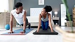 Black couple doing a workout in their bedroom with a yoga mat for wellness, health and fitness. Happy, healthy and  African man and woman training or doing exercise at home on the floor.