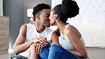 Couple kiss after fitness workout in house, reading time on smartwatch after exercise and happy with workout goal in home. Health, happy and smile African man and woman kissing after training
