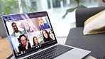 A video call on the laptop and online work meeting at home with a team. Social distance, business meeting and working remote with diverse people. Computer, virtual conversation and business people 