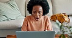 Black woman, laptop and wow face for news, stock market or email. Woman, computer and disappointed expression on floor in living room, surprise for lady trading stock online or forex on internet