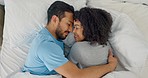 Love, wake up and hug with couple in bed together for happy, communication and sleeping. Smile, marriage and peace with man and woman lying in bedroom in the morning for relax, cuddle or conversation