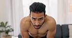 Man in home, athlete catch breath from workout and exercise deep breathe with asthma in living room. Fitness training, tired young asian person active and face breathing healthy with chest muscles