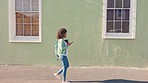 Urban woman, walking on street and holding phone while celebrating and cheering about good news, winning online completion or reaching next level on game. Female student dancing while in the city