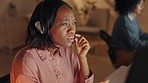 Customer service, call center and telemarketing worker angry, frustrated and upset while working at night in a office. Black woman in a helpdesk, contact us or support job consulting a client online