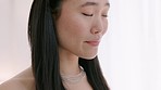 Beauty, asian woman and nervous bride in beautiful white wedding dress nervous, anxious and emotional on her special day. Anxiety, doubt and worried hands of female thinking about future and marriage