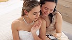 Friends, bride and bridesmaid smartphone selfie smile together for fun wedding photograph memory. Happy, joyful and cute women friendship with asian and caucasian woman looking at bridal pictures.