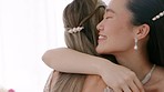 Wedding, friends and bride with a woman and her bridesmaid hugging before and marriage ceremony or celebration event. Love, romance and tradition with a young female and her best friend getting ready