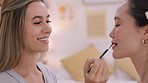 Cosmetic, makeup and beauty, woman before wedding with bridesmaid in bedroom. Luxury lip gloss, hair and brush, friends get ready for ceremony. Hair, beauty and the morning of marriage celebration.