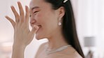 Woman excited with friend, dance and show wedding ring on hand in room in house. Happy young Asian bride dancing together with bridesmaid on wedding day, in room at family home or hotel